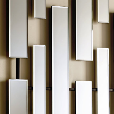 Abstract vertical mirror panel wall decor in a contemporary geometric arrangement.