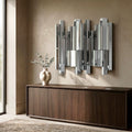 Statement mirrored wall décor styled above a console, showcasing layered mirrored panels for a sculptural contemporary look.