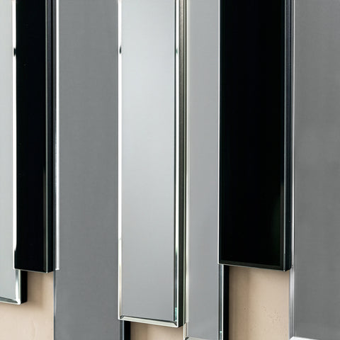 Close-up of decorative vertical mirror panels with reflective surfaces and minimalist styling.
