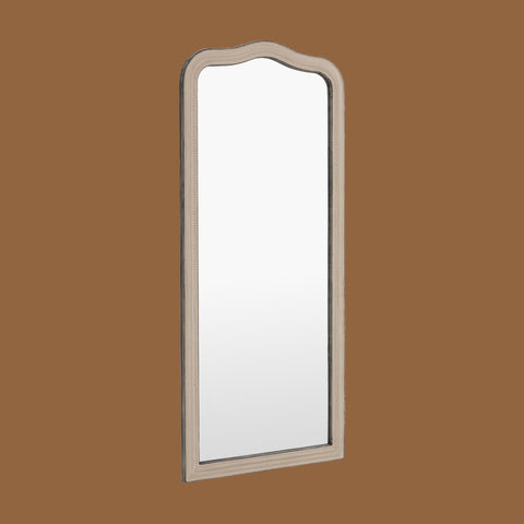 Full-length grey leaner mirror with a softly curved silhouette, distressed finish and delicate beaded detailing.