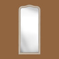 Statement leaner mirror with a textured grey finish and elegant curved frame design.