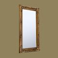 Elegant vintage-style full-length mirror with decorative gold frame and classic ornamental carvings.