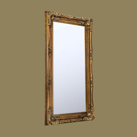 Elegant vintage-style full-length mirror with decorative gold frame and classic ornamental carvings.