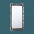 Vintage-style full-length leaner mirror with intricate silver baroque detailing and elegant styling.