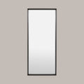Rectangular Large leaner mirror with black frame - face on, on a grey background