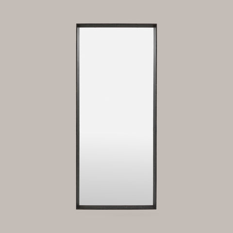Rectangular Large leaner mirror with black frame - face on, on a grey background