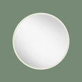 Minimalist circular wall mirror with clean white edging and contemporary styling.