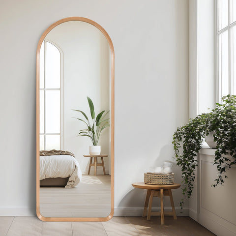 Huxley Arch Leaner Mirror in oak sharing a living room space