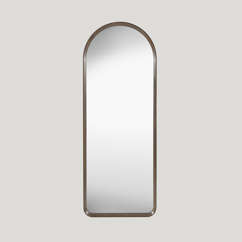 Large arched walnut mirror on a soft grey background