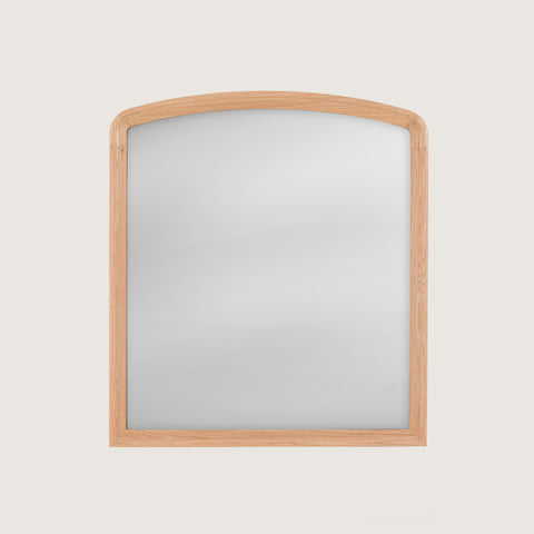 Huxley Oak-framed mirror on a light grey background