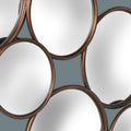 Contemporary bronze cluster wall mirror.
