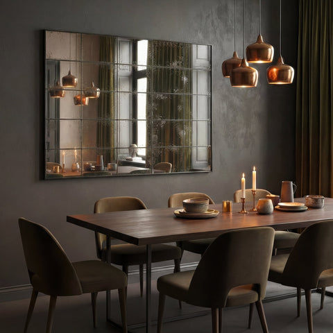 Decorative rectangular grid mirror styled in a modern dining space with pendant lighting and candle accents.