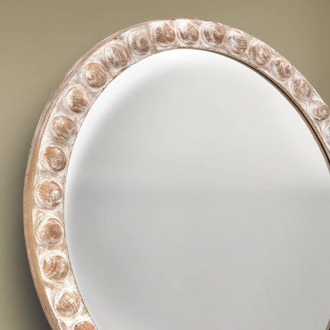 Rowan arch mirror close-up showing wooden bobble frame texture