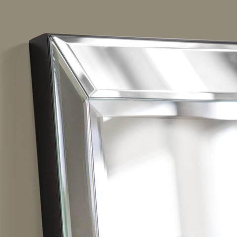 Bevelled mirrored frame detail with sleek angular edges and contemporary styling.