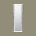 Elegant full-length freestanding mirror with bevelled mirrored frame.
