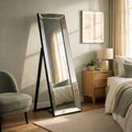 Elegant full-length freestanding mirror with a sleek mirrored frame and adjustable stand, designed to bring light, depth, and effortless sophistication to any space.