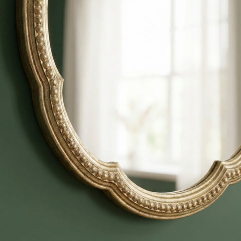 Close-up of the ornate scalloped frame showcasing textured beaded detailing and an aged finish for timeless vintage appeal.