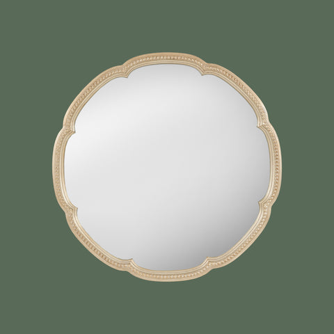 Elegant vintage-inspired scalloped mirror with textured detailing.