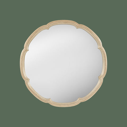 Round scalloped wall mirror with ornate champagne gold frame and decorative beaded detailing, face on view